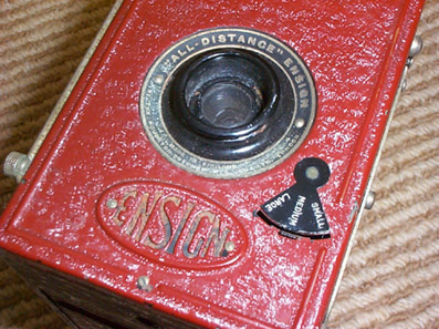 All Distance Box camera in red.